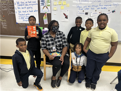 School Culture Facilitator reading during March is Reading Month.